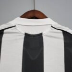 camiseta retro newcastle cuello anteriore