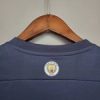 Tercera equipación Stadium Manchester City 2021/22 diseño de cuello dorsal