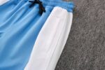 Bolsillo de pantalon de Chandal Lakers azul claro con capucha
