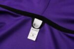 Etiqueta de talla chandal lakers morado con capucha