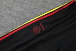 Logo 2 del pantalon de la tercena equipacion ajax bob marley