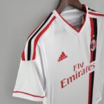 camiseta milan 2011 pecho lateral