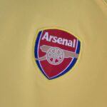 ESCUDO Camiseta del Arsenal Segunda Equipación 2223 Versión Aficionado ESCUDO Camiseta del Arsenal Segunda Equipación 2223 Versión Aficionado
