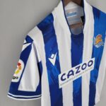 Camiseta Real Sociedad primera equipación 2022 - 2023 versión fan lateral Camiseta Real Sociedad primera equipación 2022 - 2023 versión fan lateral