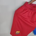 Pantalón corto azul Barcelona primera equipación 2021-2022 lateral Pantalón corto azul Barcelona primera equipación 2021-2022 lateral