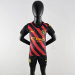Conjunto niños Manchester City segunda equipación 22-23 - frontal