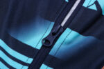 Cremallera de la chaqueta del chándal azul oscuro del Manchester City 2022-2023 Cremallera de la chaqueta del chándal azul oscuro del Manchester City 2022-2023