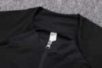 Cuello de la chaqueta del conjunto chándal negro del Chelsea 2022-2023 Cuello de la chaqueta del conjunto chándal negro del Chelsea 2022-2023