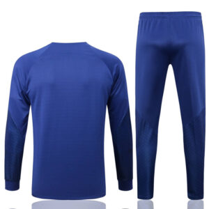 Dorso del conjunto de chándal azul de la FC Barcelona 2022-2023