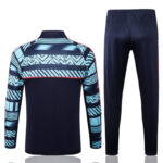 Dorso del conjunto del chándal azul oscuro del Manchester City 2022-2023 Dorso del conjunto del chándal azul oscuro del Manchester City 2022-2023