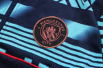Escudo del chándal azul oscuro del Manchester City 2022-2023 Escudo del chándal azul oscuro del Manchester City 2022-2023