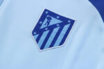 Escudo del chándal celeste del Atlético de Madrid 2022-2023 Escudo del chándal celeste del Atlético de Madrid 2022-2023