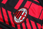 Escudo del chándal negro de la A.C Milan 2022-2023