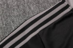 Hombro de la chaqueta del chándal negro de la Juventud 2022-2023 Hombro de la chaqueta del chándal negro de la Juventud 2022-2023