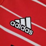 Body del Bayern Munich primera equipación 2022-2023 logo Body del Bayern Munich primera equipación 2022-2023 logo