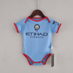 Body del Manchester City primera equipación 2022-2023 frontal Body del Manchester City primera equipación 2022-2023 frontal
