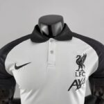 Polo Liverpool Negro y Blanco 2022-2023 cuello 2