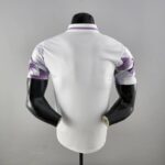 Polo Real Madrid blanco púrpura 2022-2023 dorso
