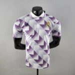 Polo Real Madrid blanco púrpura 2022-2023 frontal