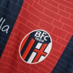 Camiseta Bolonia primera equipación 2022-2023 escudo