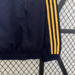 chaqueta reversible real madrid bolsillo y manga