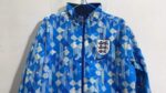 Cortavientos inglaterra color azul reversible cuello