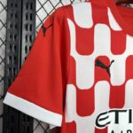 camiseta-girona-primera-equipacion-2024-2025-puño-derecho