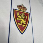 Camiseta-real-zaragoza-primera-equipacion-2024-2025-escudo