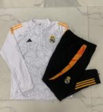 Chandal Real Madrid Blanco y Negro 2024-2025 parte delantera Chandal Real Madrid Blanco y Negro 2024-2025 parte delantera