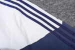 Chaqueta Gabardina Real Madrid Blanco-Azul hombro Chaqueta Gabardina Real Madrid Blanco-Azul hombro