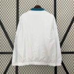 Cortaviento Reversible Real Madrid Celeste-Blanco 2024-2025 dorsal blanco Cortaviento Reversible Real Madrid Celeste-Blanco 2024-2025 dorsal blanco