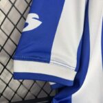 camiseta-real-sociedad-primera-equipacion-2002-2003-puño-derecho