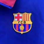 Cortaviento Reversible FC Barcelona Rojo Azul 2024-2025 logo