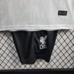 conjunto-niño-liverpool-tercera-equipacion-2024-2025-escudo-pantalon conjunto-niño-liverpool-tercera-equipacion-2024-2025-escudo-pantalon