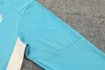 Chandal Marsella Celeste 2024-2025 hombro