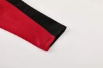 chandal-ac-milan-negro-rojo-2024-2025-puño chandal-ac-milan-negro-rojo-2024-2025-puño