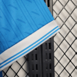 camiseta-napoli-primera-equipacion-2025-2026-puño camiseta-napoli-primera-equipacion-2025-2026-puño
