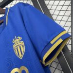 camiseta-as-monaco-segunda-equipacion-2025-2026-puño camiseta-as-monaco-segunda-equipacion-2025-2026-puño