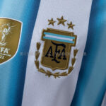 camiseta-argentina-primera-equipacion-mundial-2026-escudo camiseta-argentina-primera-equipacion-mundial-2026-escudo
