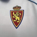 camiseta-real-zaragoza-primera-equipacion-2025-2026-escudo camiseta-real-zaragoza-primera-equipacion-2025-2026-escudo