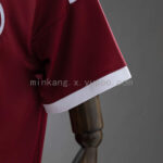 camiseta-qatar-primera-equipacion-2026-puño