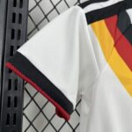 conjunto-niño-alemania-primera-equipacion-2025-2026-puño
