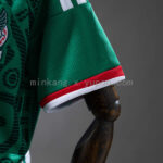 conjunto-niño-mexico-primera-equipacion-2026-puño conjunto-niño-mexico-primera-equipacion-2026-puño