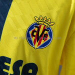 conjunto-niño-villarreal-primera-equipacion-2025-2026-escudo conjunto-niño-villarreal-primera-equipacion-2025-2026-escudo