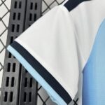 camiseta-argentina-primera-equipacion-mujer-mundial-2026-puño