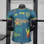 camiseta-ajax-edicion-especial-bob-marley-version-jugador-azul-2025-2026 camiseta-ajax-edicion-especial-bob-marley-version-jugador-azul-2025-2026