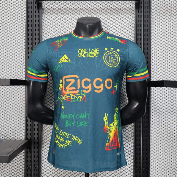 camiseta-ajax-edicion-especial-bob-marley-version-jugador-azul-2025-2026 camiseta-ajax-edicion-especial-bob-marley-version-jugador-azul-2025-2026