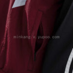 cortaviento-ajax-crimson-2025-2026-lateral cortaviento-ajax-crimson-2025-2026-lateral