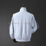 cortaviento-real-madrid-reversible-2025-2026-parte-trasera