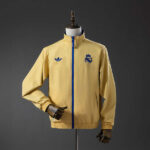 cortaviento-real-madrid-reversible-azul-y-amarillo-2025-2026-2 cortaviento-real-madrid-reversible-azul-y-amarillo-2025-2026-2